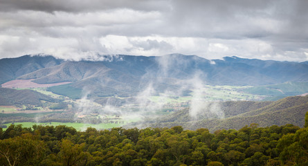 Panoramic Australian Alpine landscape Valley View with low clouds