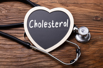 Stethoscope And Heart With Word Cholesterol