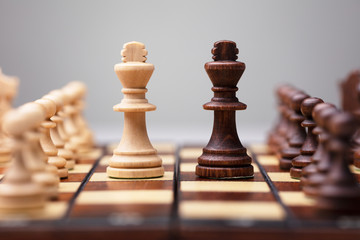 Wooden Chess Pieces On Board Game
