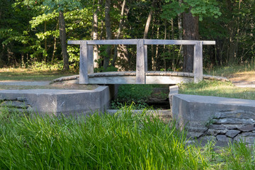Small wooden bridge in park, Halifax, calm, pond, no people.