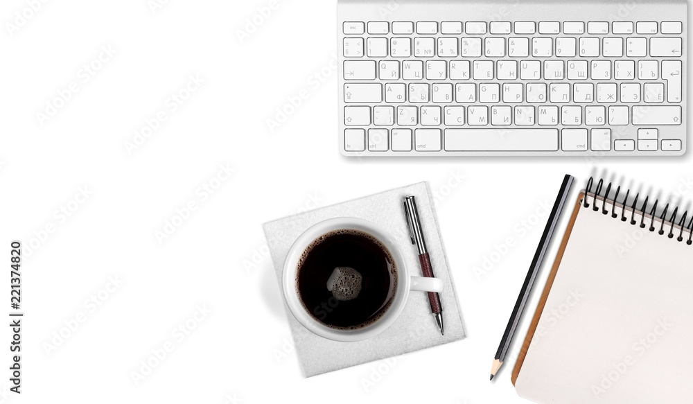 Poster computer keyboard at workplace and cup isolated on background
