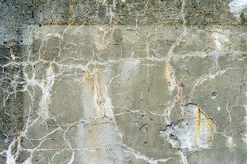 concrete wall as a texture destroyed by time