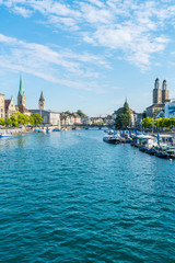 Zurich city center with famous Fraumunster and Grossmunster Churches and river Limmat - obrazy, fototapety, plakaty