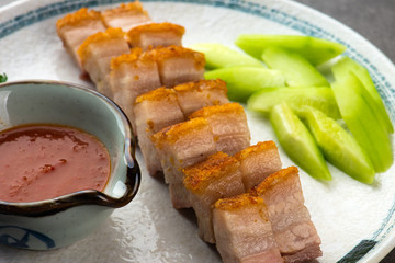 Crispy Oriental Roast Pork Belly with background