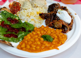 Vegetarian Mediterranean dish on white plate close-up vegetarian food concept