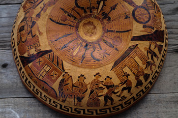 Carved gourd from Ecuador showing musicians and dancers