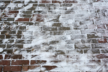 Paving slabs with snow in winter 