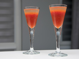 Two glasses with tomato juice and vodka. Bloody Mary cocktail.