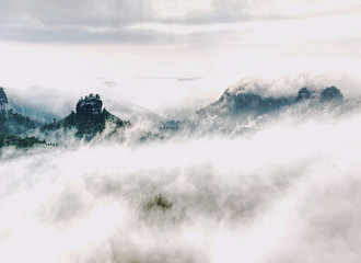 Obraz premium Fantastic dreamy sunrise on the mountains with view into valley
