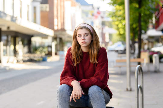 Young girl student with urban background