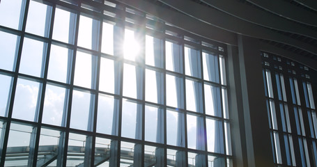 Airport window with sunlight flare