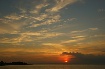 clouds at sunset. Playa Larga Cuba. bay of pigs. sunset on the caribbean sea
