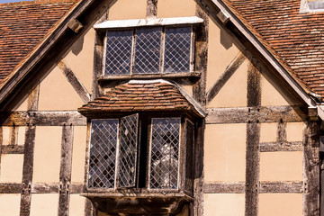 British vintage house windows in the old town.