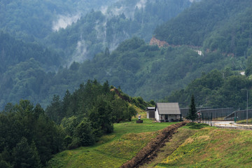 Obraz premium Serbian landscape view on foggy forest mountains after rain near Zaovine lake