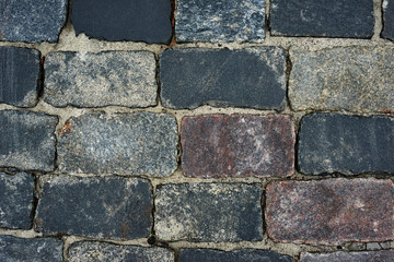 old cobblestone road for background or texture