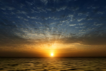 Naklejka na ściany i meble Sunset sky on the lake