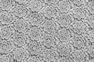White lace with small flowers. No any trademark or restrict matter in this photo.