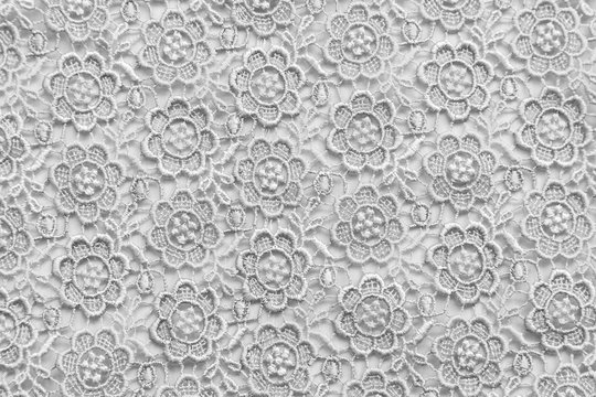White lace with small flowers. No any trademark or restrict matter in this photo.