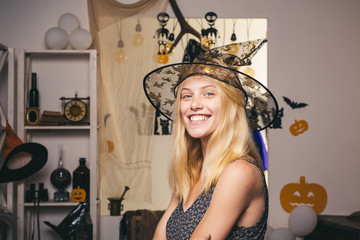 Background decorated for Halloween. Halloween dresses and witch costumes and witch hats. Happy...