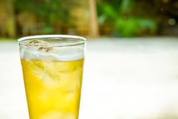 A glass of beer with white and blur background. time to celebrate festival for hang out. time to chill out with friend concept. 