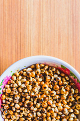 Fried Corn on the wooden Table