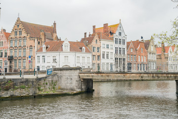 Fototapeta na wymiar Beautiful street view with bridge and river of the Brugge city