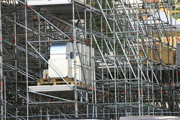 metal prefabricated structures / abstract background metal beams and pipes in prefabricated industrial structures, construction of temporary structures