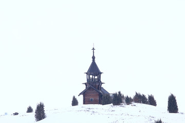 Fototapeta premium wooden church in Finland / winter landscape in Scandinavia view of the wooden church, old architecture
