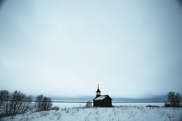 landscape in russian kizhi church winter view / winter season snowfall in landscape with church...