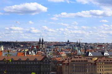 Naklejka na ściany i meble Prague view / panoramic landscape of the czech republic, Prague view with red roofs of houses from above, landscape in the European capital