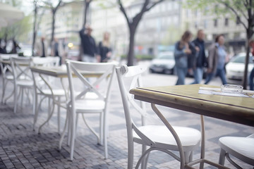 outdoor cafe / table and serving in an outdoor cafe in Paris, France, summer meal outdoors