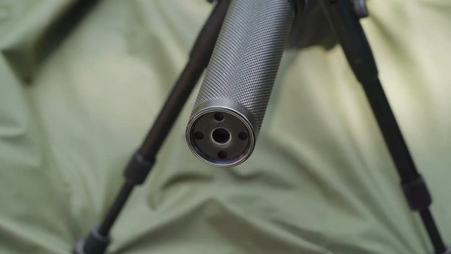 19444_Five_holes_on_the_firearm_tip_of_the_sniper.mov