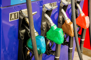 Fuel Pump, Gas Station, Gasoline.Colorful Petrol pump filling nozzles isolated on white background...