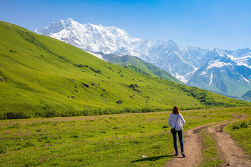 girl on road to Mount Shkhara panoramic view