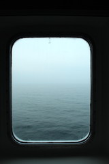 Ship cabin window view: northern sea