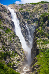 high waterfall Mazery in Georgia in sunny day