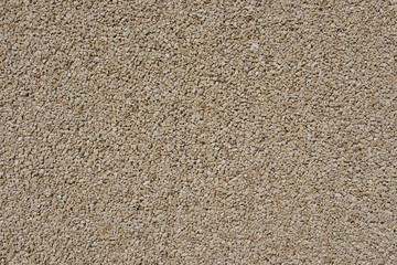 Surface de petits cailloux de marbre rose