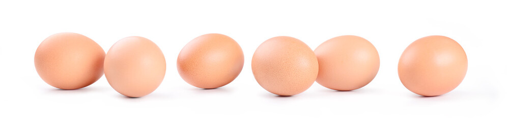 Six chicken eggs on white background