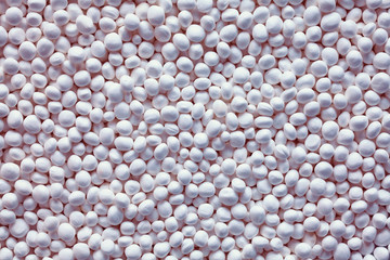 Color toned styrofoam balls, abstract texture or background.