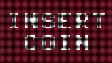 An Insert Coin text message on a LED board. White characters on a red background.
