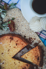 Breakfast. Coffee and pie with fruit filling on the table.