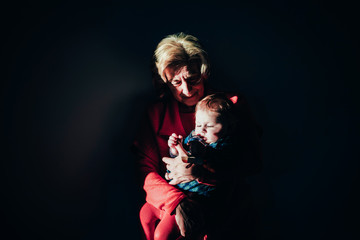 moment of family intimacy between grandma and her granddaughter