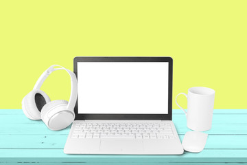 Fototapeta premium New headphones and laptop on the table
