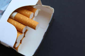 cigarettes with a filter lie in one heap