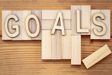goals banner - text in vintage letters on wooden blocks