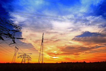 Fototapeta na wymiar Pylon, high-voltage tower sky background.