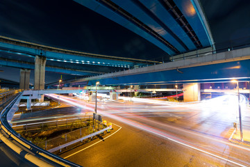 Fototapeta na wymiar Traffic rail under highway at night