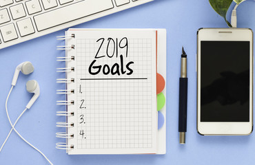 GOALS 2019 inscription in notepad on table
