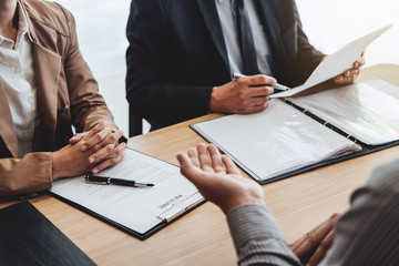 Business man explaining about his profile to two senior manager sitting in during job Interview, interview the job and hiring