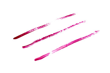 Red strip line made of nail polish isolated on white background.